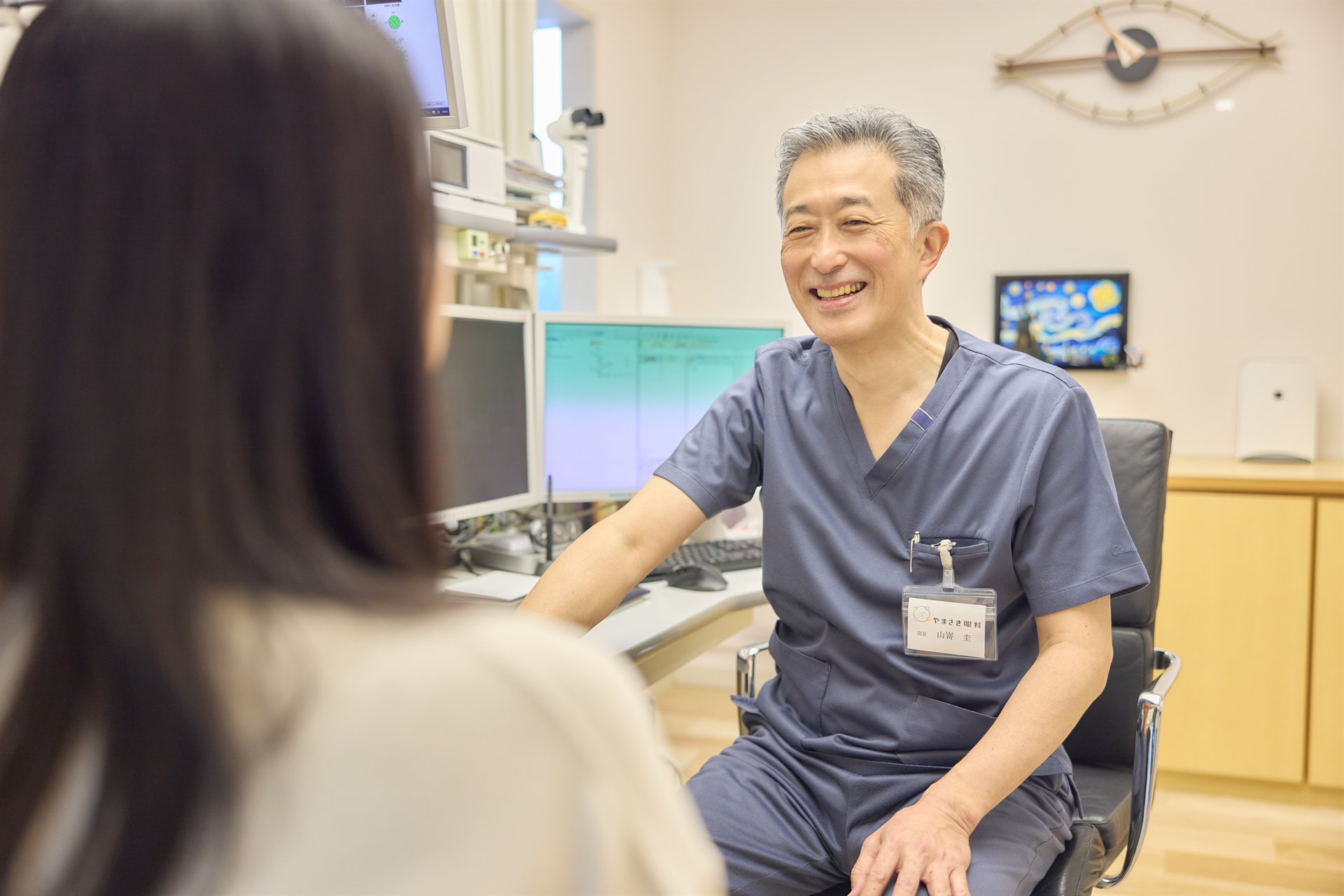 診察で説明を受ける患者さま